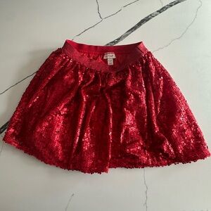 Girls Cat & Jack red sequin skirt.